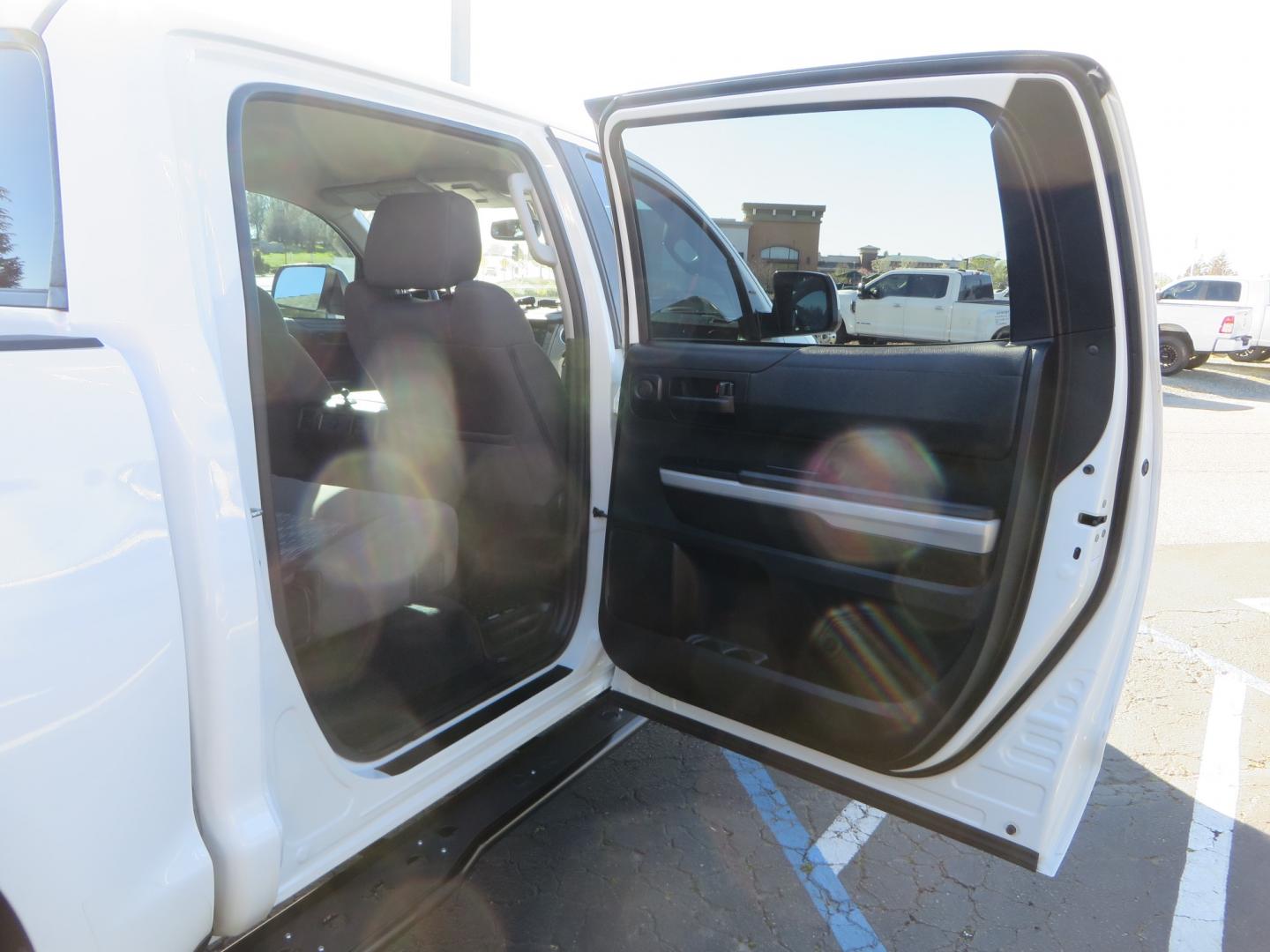 2020 White /GREY Toyota Tundra SR5 (5TFDY5F19LX) with an 5.7L engine, automatic transmission, located at 2630 Grass Valley Highway, Auburn, CA, 95603, (530) 508-5100, 38.937893, -121.095482 - Features - King Off Road adjustable remote reservoir coil overs, King 2.5 adjustable remote reservoir rear shocks, Method Race wheels, Falken Wildpeak tires, Sliders, Bed braces, Borla Exhaust, Husky floor mats, Window tint, and Ram phone mounts. - Photo#47